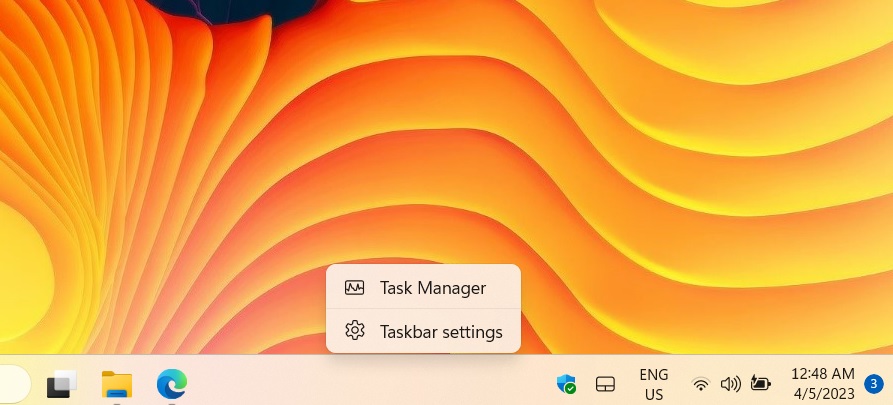 Right-click on taskbar to open Task Manager. 