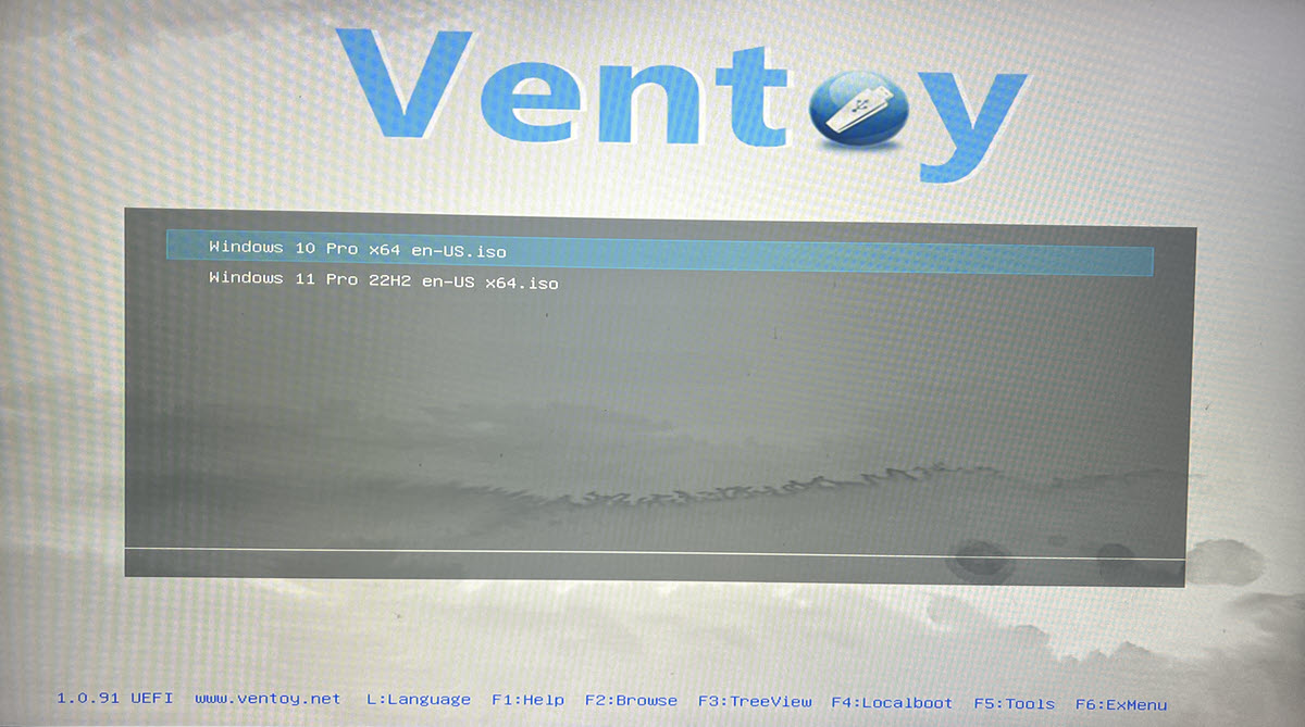 Ventoy boot menu with different OS versions available.