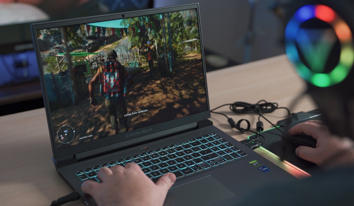 Gamer playing on a Windows laptop.