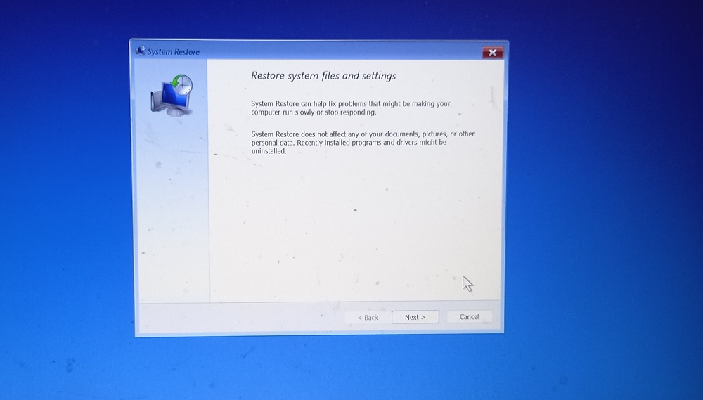 restoring system files and settings in Windows 11 Advanced Startup Mode by clicking System Restore. 