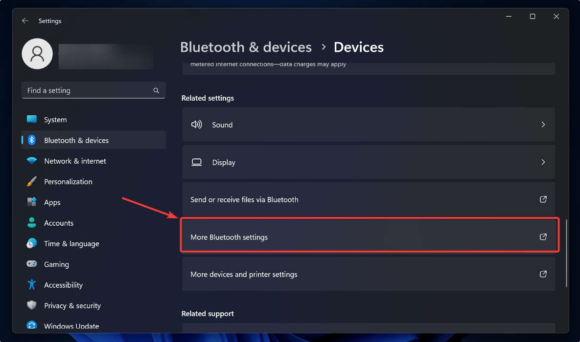 Navigating to "More Bluetooth settings" in Windows Settings. 