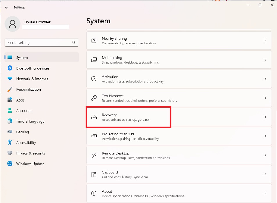 Tap on "Recovery" under System in Windows 11 Settings. 