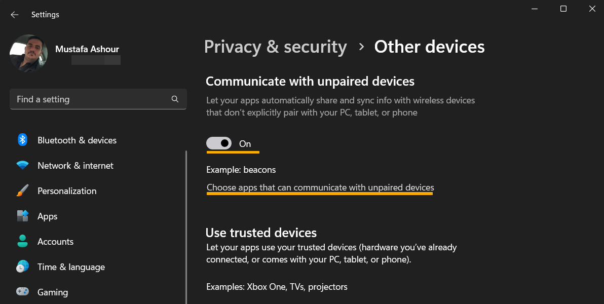 Disabling the "Communicate with unpaired devices" option in Windows Settings. 