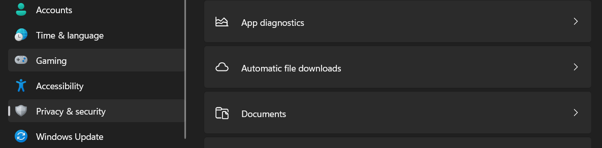 Clicking on "Automatic file downloads" section in Windows Settings.