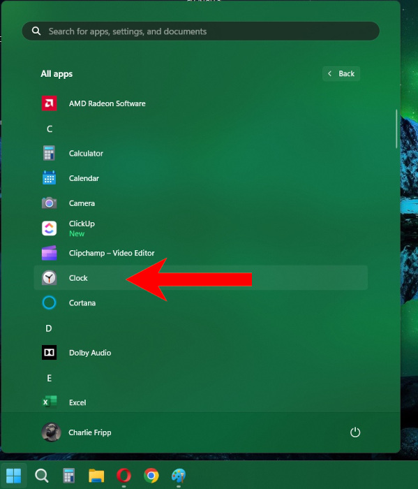Selecting "Clock" from app list.