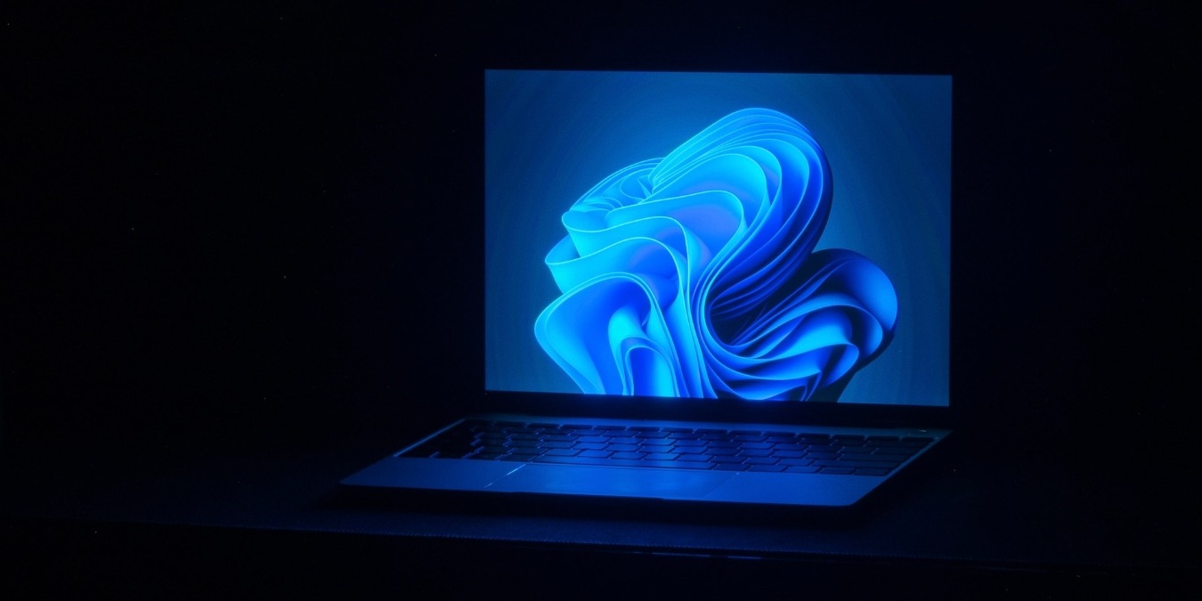 Laptop with a Windows 11 wallpaper
