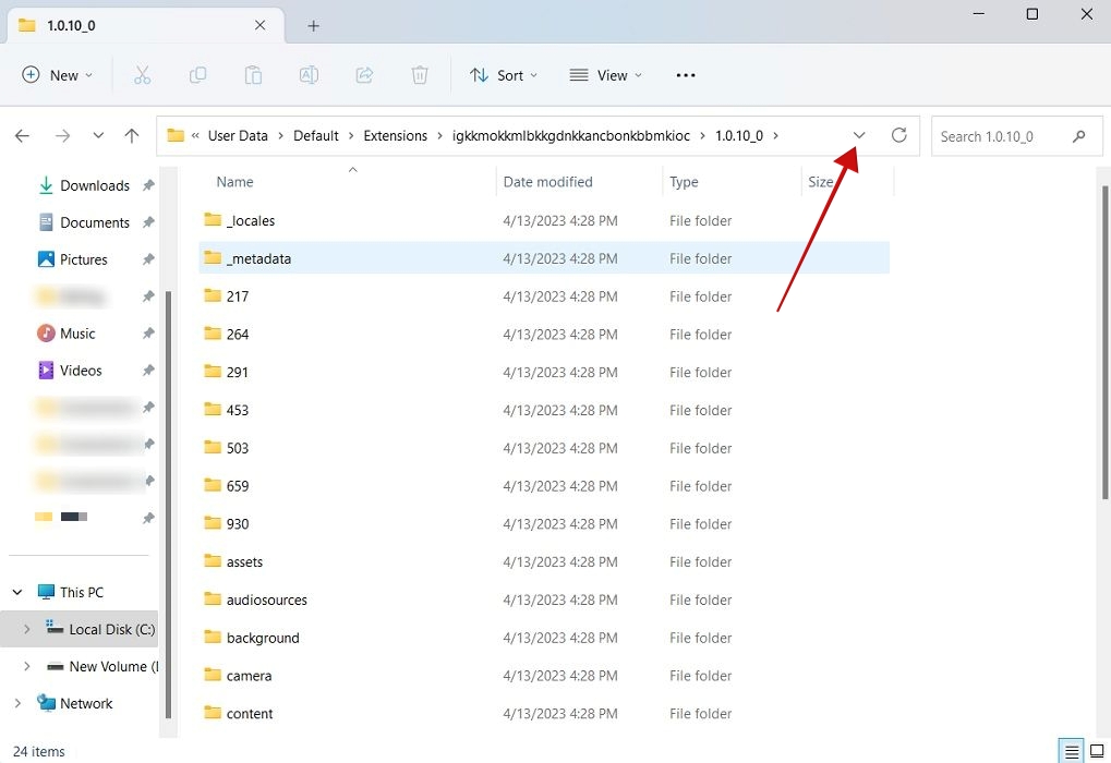 Pressing downward icon to reveal folder path in File Explorer.
