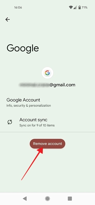 Tapping on "Remove account" button under Google account details on Android phone.