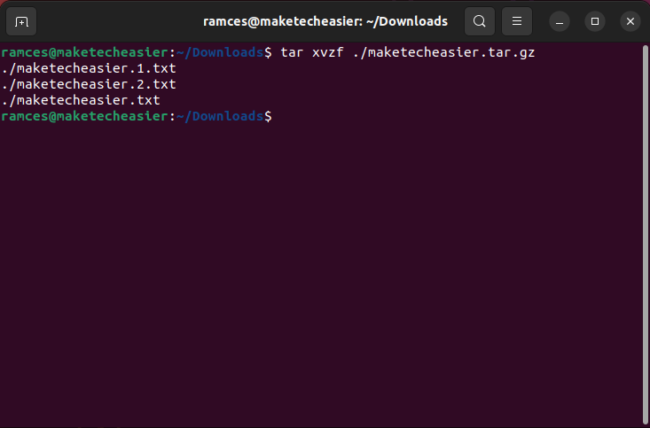 A terminal showing the unzipping process using tar.
