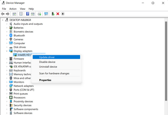 Clicking on "Update driver" option in Device Manager.
