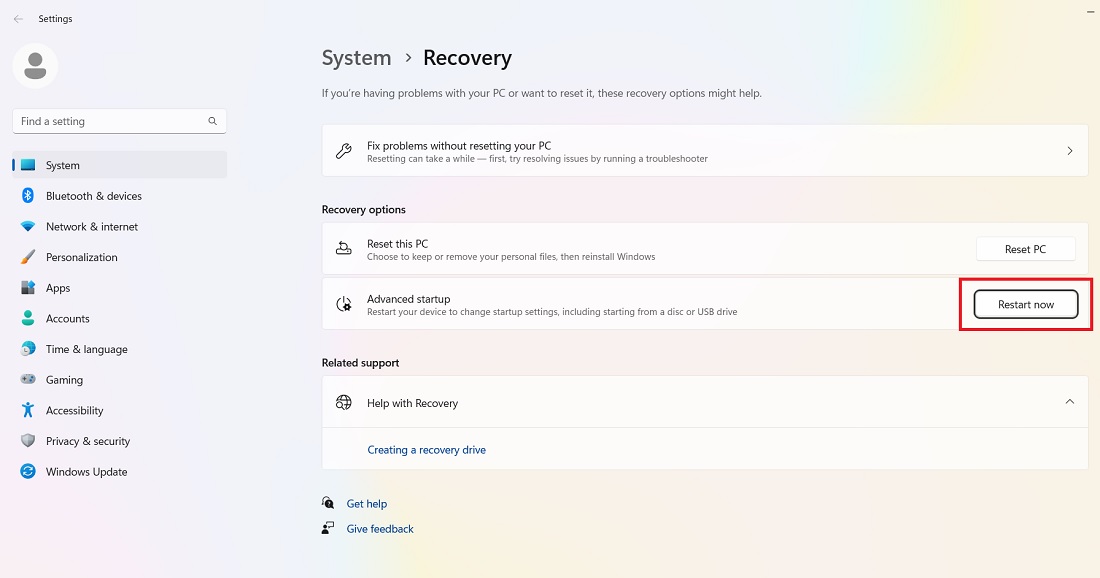 Clicking "Restart now" button under "Recovery" in Windows. 