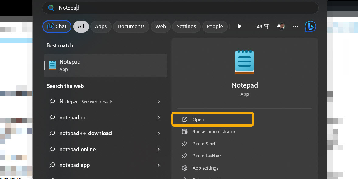 Typing "Notepad" in Windows Search. 