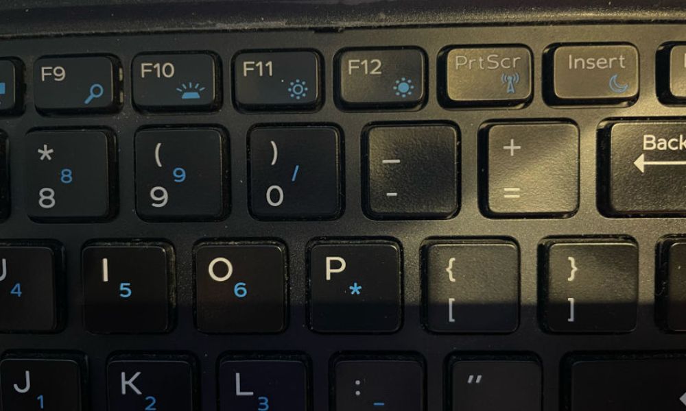 Sun icon on F11/F12 keys on laptop keyboard