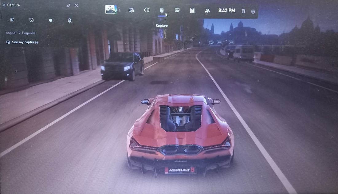 Click Capture Button  on Xbox Game Bar to record a game. 