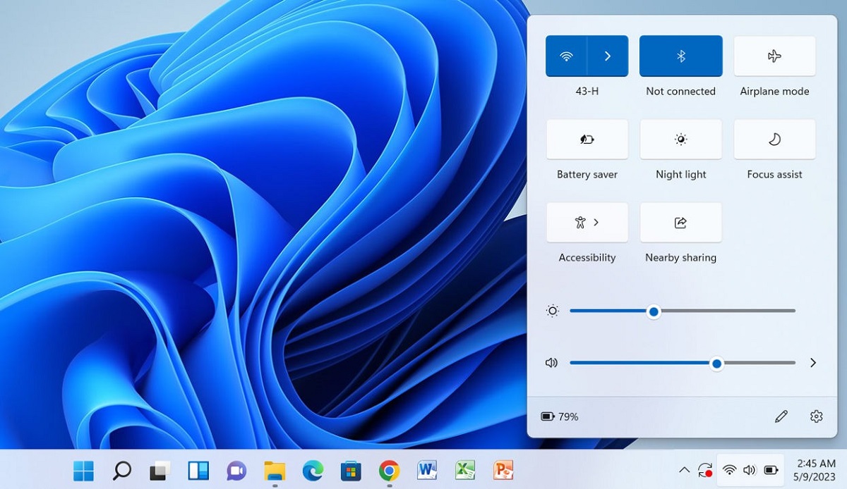 Dragging top slider to adjust brightness in Windows. 