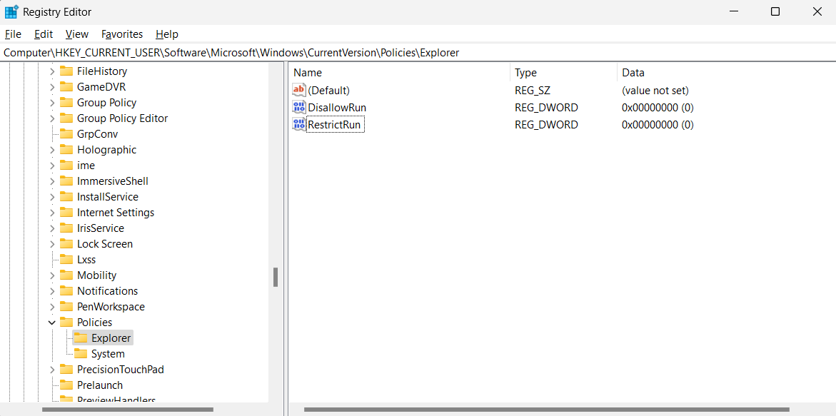 Creating "RestrictRun" value in Registry Editor.