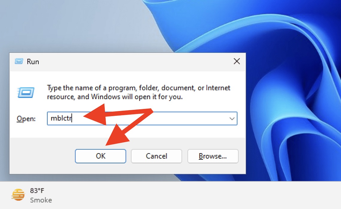 Type "mblctr" in Run box in Windows. 