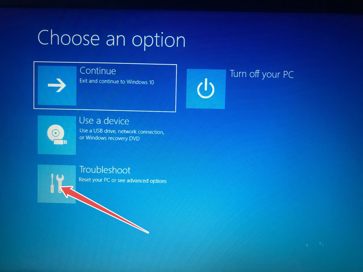 Clicking "Troubleshoot" option in Recovery environment.