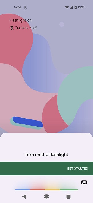 Giving Google Assistant command to turn on flashlight.