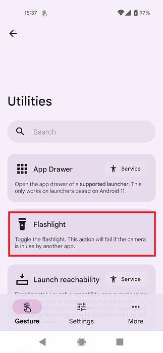 Selecting "Flashlight" option in Tap Tap app on Android.