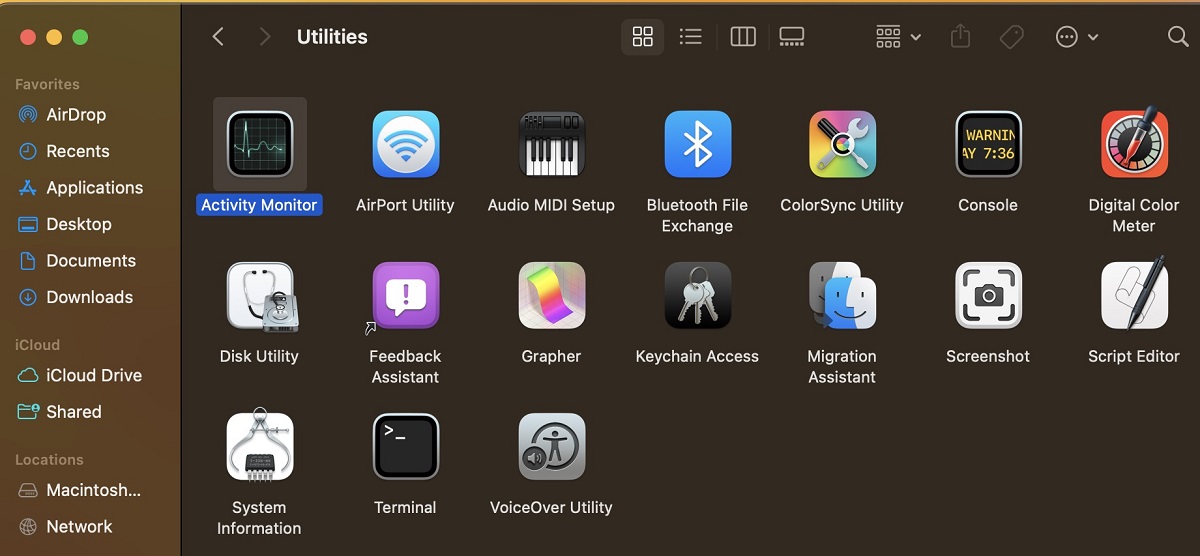 Clicking on Activity Monitor on Mac. 