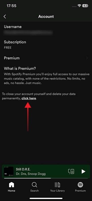 Tapping on "Click here" to delete free Spotify account.