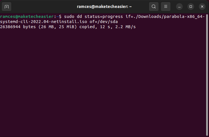 A terminal showing the image writing process in dd.