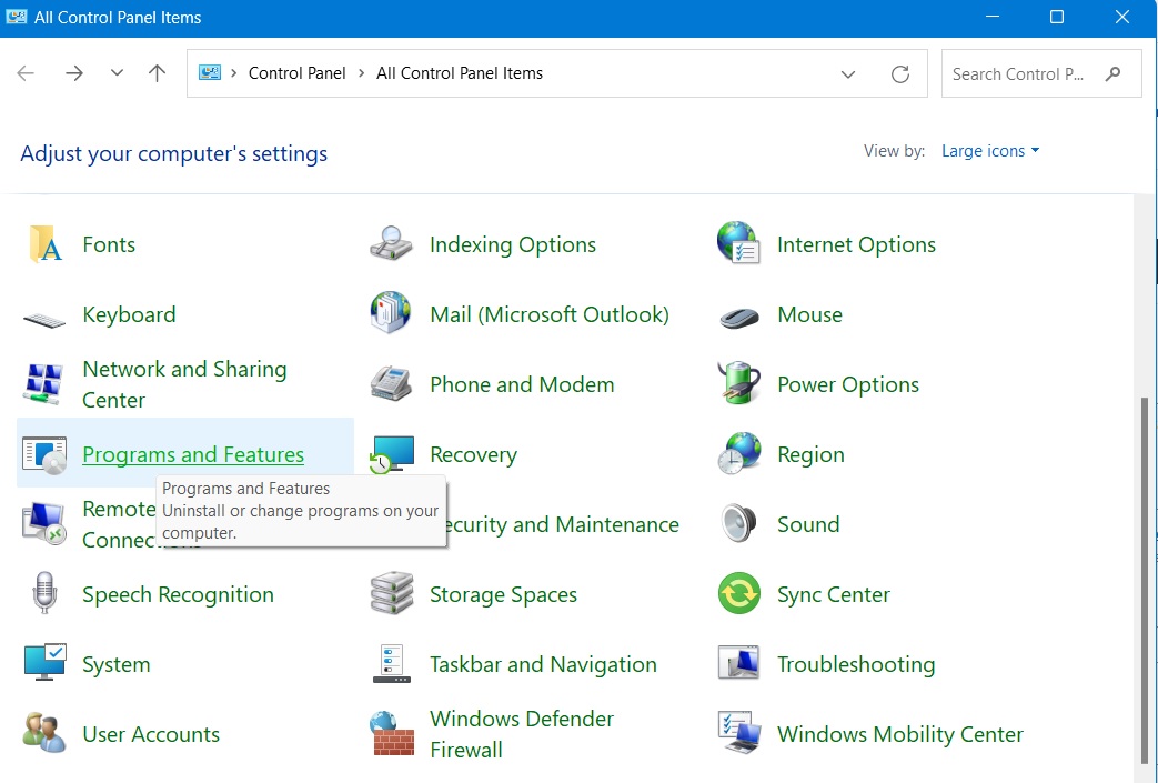 Clicking on "Programs & Features" in Control Panel.
