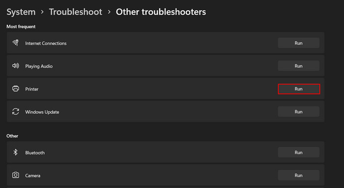 Click on "Run" button next to Printer troubleshooter.