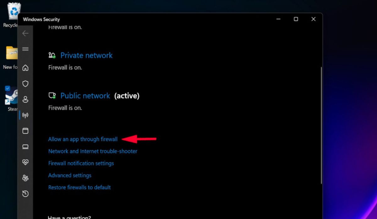 Selecting "Allow an app through firewall" in Windows Security.