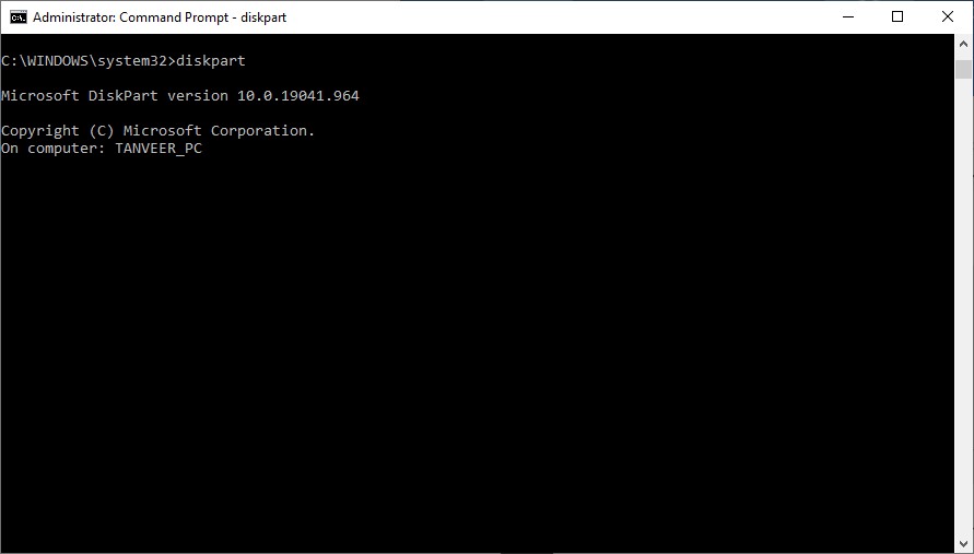 Using diskpart command in Command Prompt.