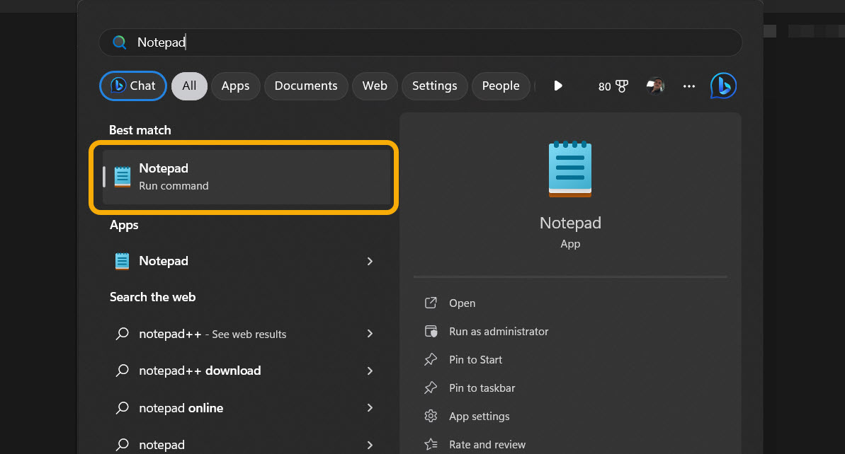 Typing Notepad in Windows Search. 