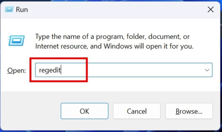 Typing "regedit" in Run box.