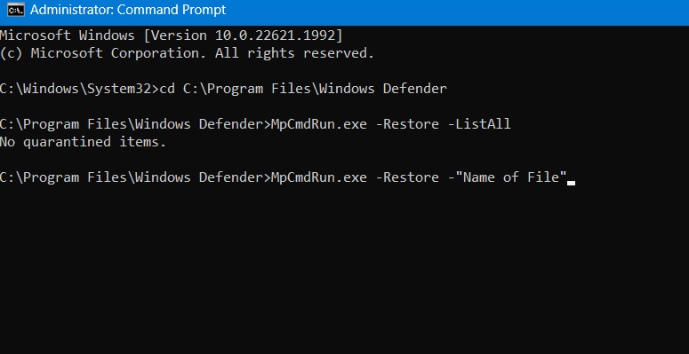 Restoring a quarantined file in Windows Defender by name in the Command Prompt. 
