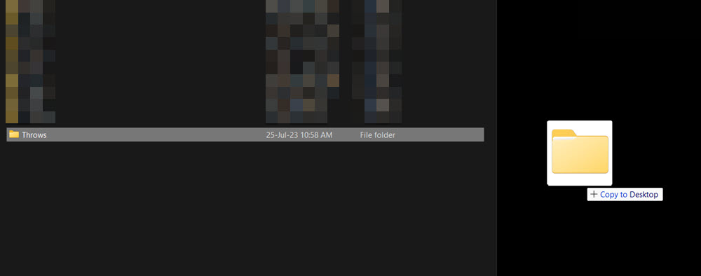 Drag and dropping a folder to the desktop. 