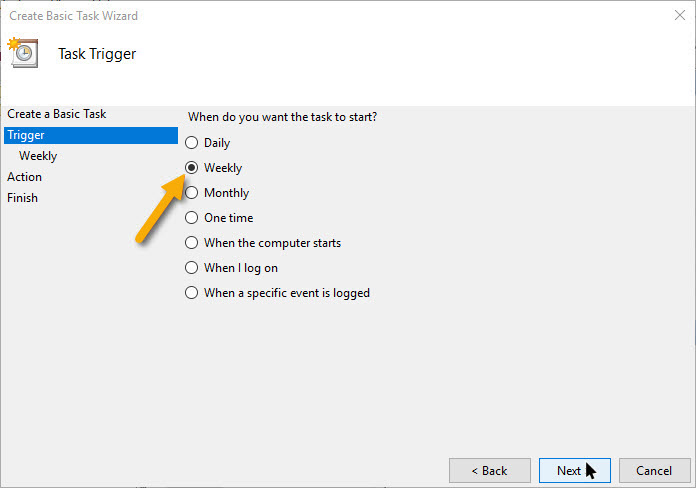 Setting a task trigger in Task Scheduler.