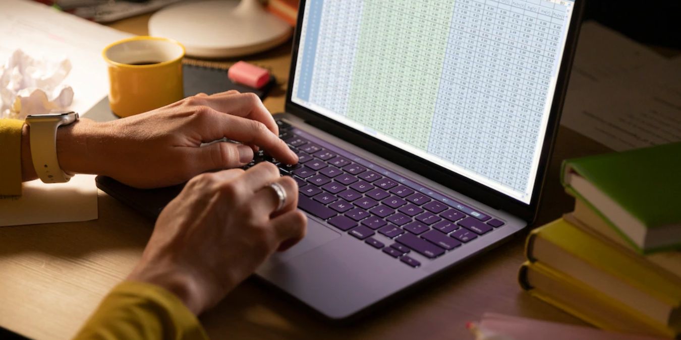 A person working on a spreadsheet