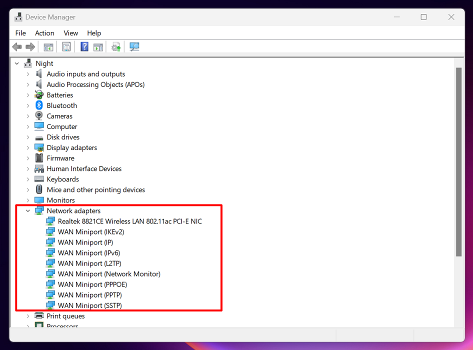 Clicking on "Network Adapters" under Device Manager.