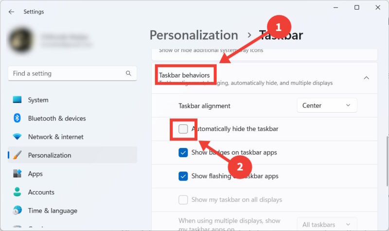 Turning off "Automatically hide the taskbar" option in Windows 11.