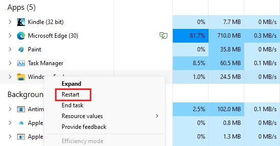 In Task Manager, right-click Windows Explorer and select "Restart."