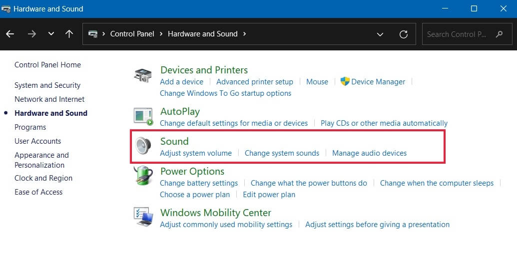 Clicking on "Sound" under "Hardware and Sound" in Control Panel.