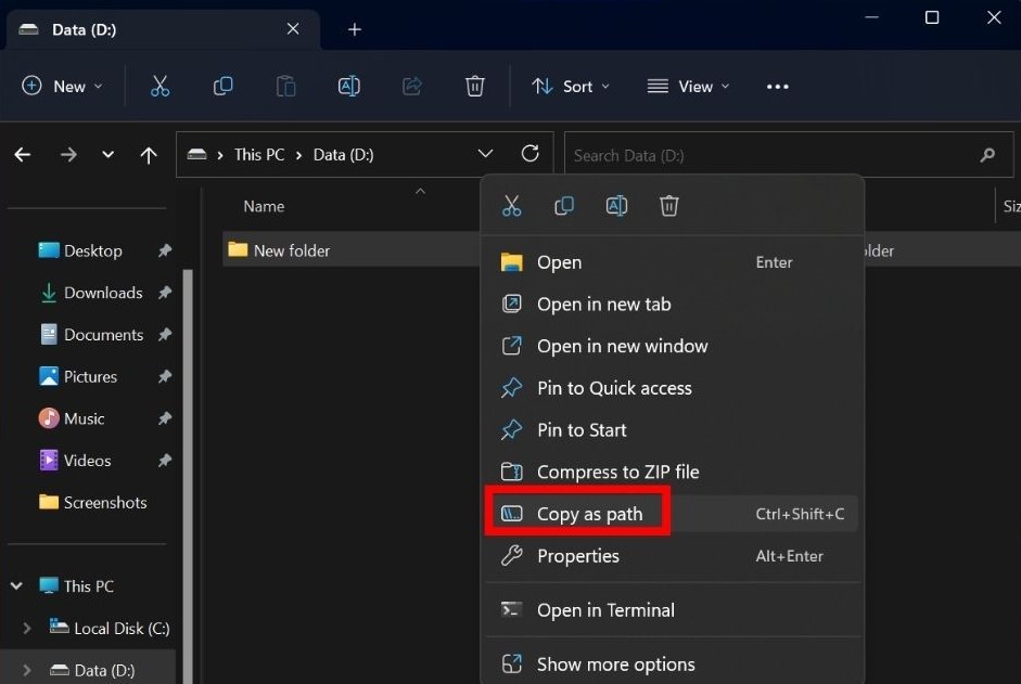 Selecting "Copy as path" option in folder context menu.
