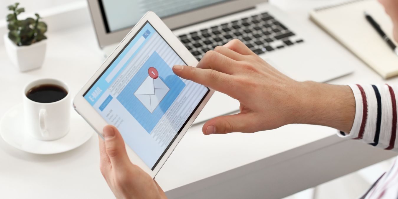 Woman Checking Email Using Outlook Alternative