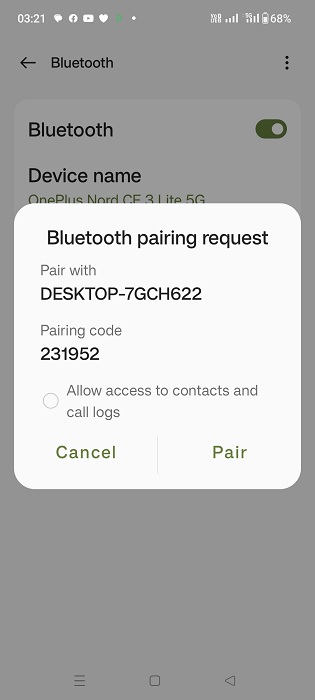 Bluetooth pairing request as PIN shown on Android phone.