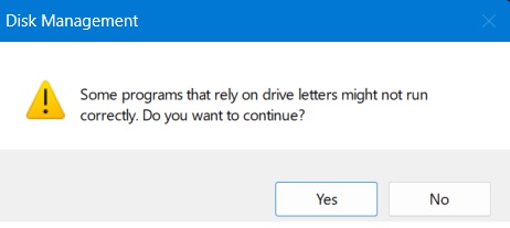 Warning in Disk Management when changing USB letter.