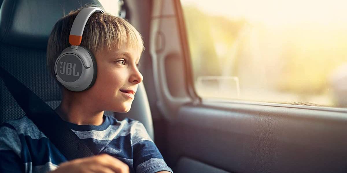 Kid in Car With JBL Noise-Canceling Headphones