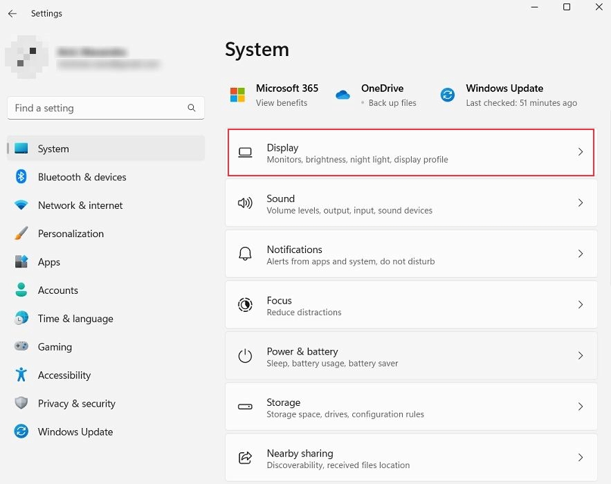 Clicking on "Display" under "System" in Settings app.