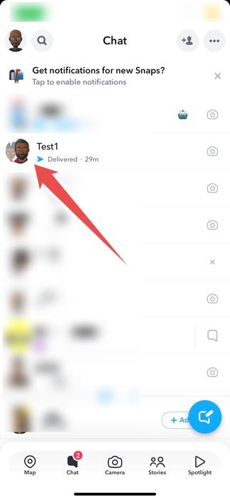 Tapping the group chat in Snapchat app. 