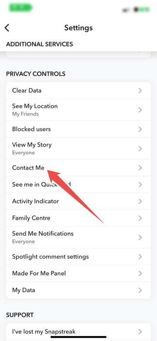 Tapping on the "Contact Me" option in Snapchat Settings.