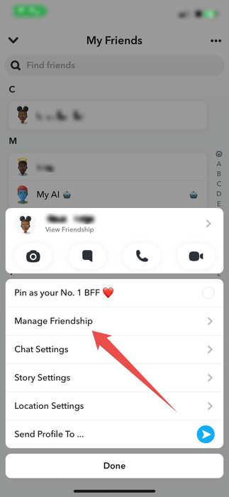 Selecting "Manage Friendship" from the pop-up menu at the bottom in Snapchat app.